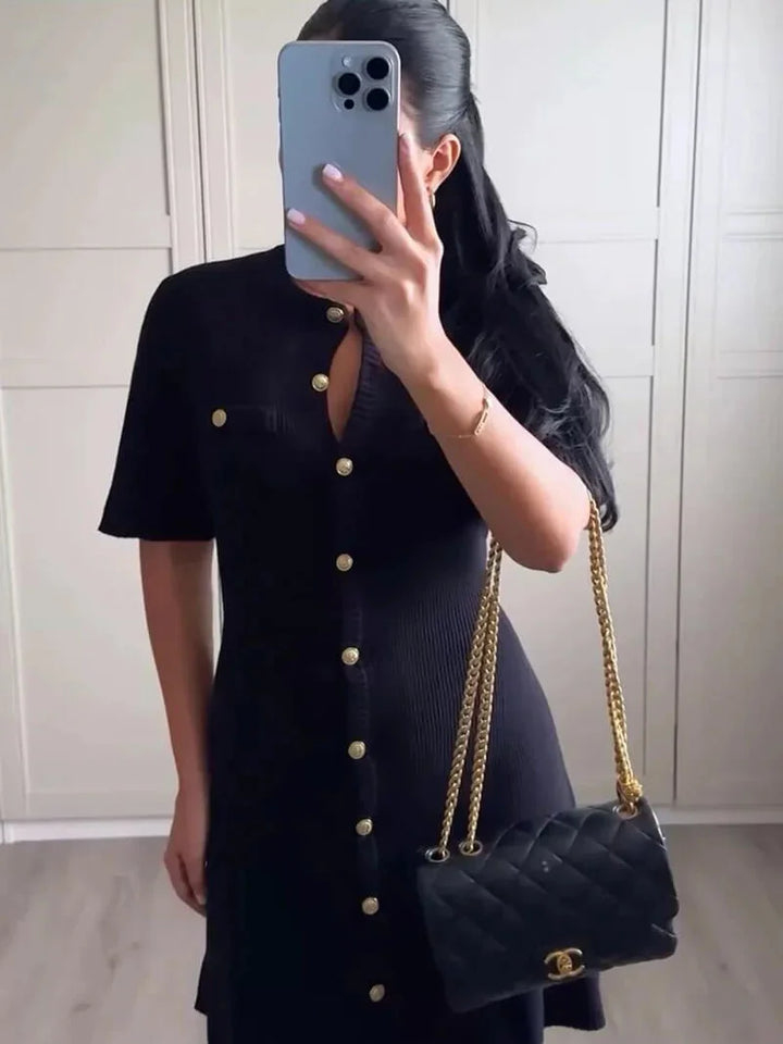 Short sleeve ribbed mini dress in Ashlee style, textured knit fabric, form-fitting silhouette, perfect for a casual yet…