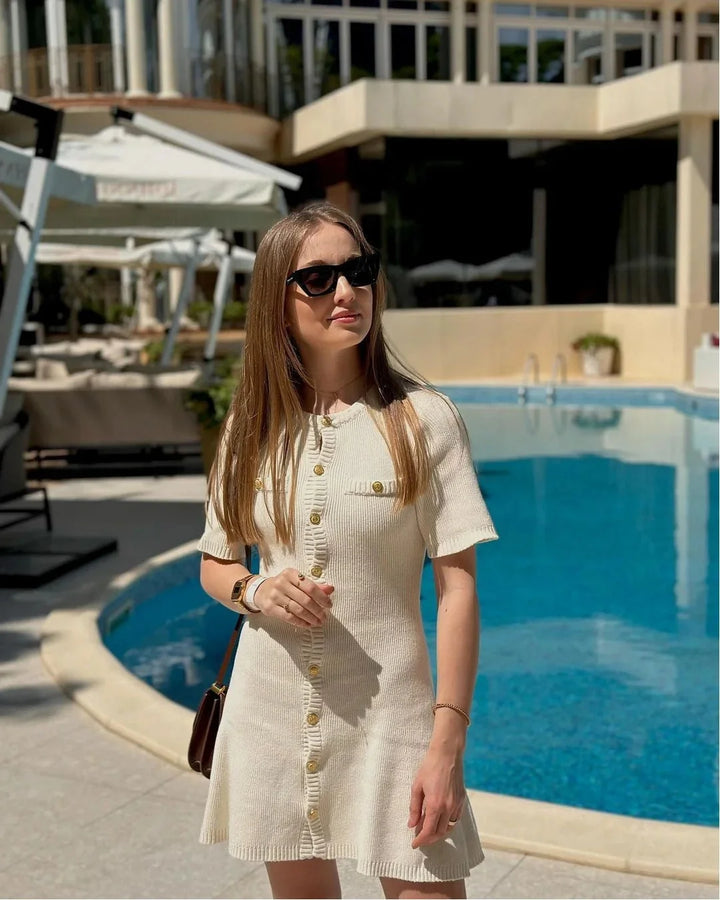 "Ribbed mini dress with short sleeves in ashlee color, perfect for casual chic outfits."