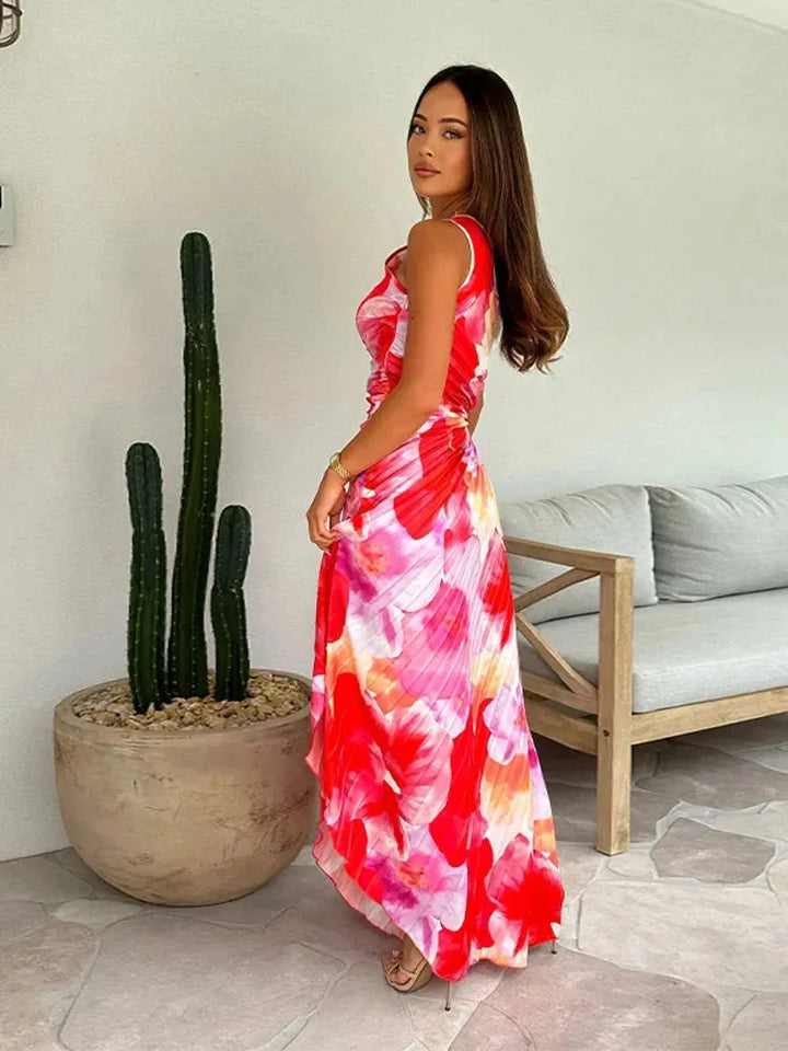 "Floral maxi dress with an asymmetric neckline, made of lightweight fabric in a stylish design."