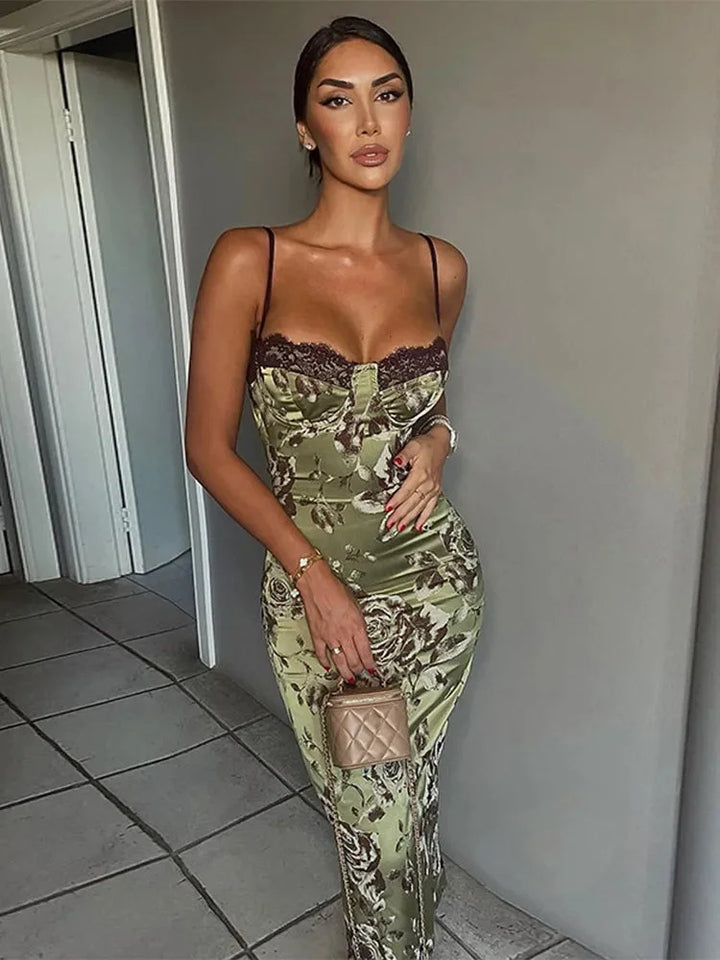 Green floral midi dress with a strapless design. Made from lightweight, flowy fabric perfect for a summer day out.