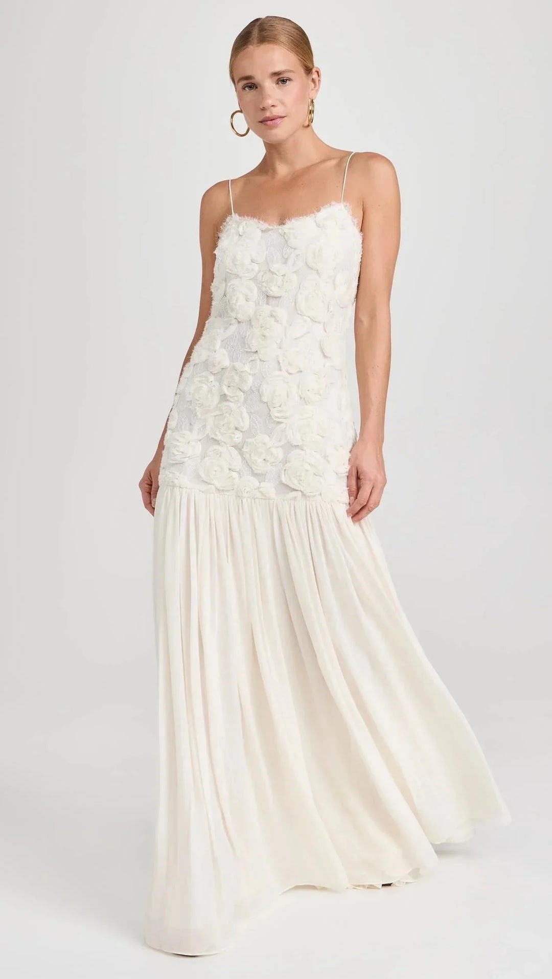 Sleeveless lace top maxi dress in a delicate ivory lace overlay design, perfect for a romantic and elegant look.