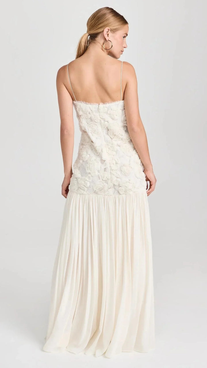 Sleeveless lace top maxi dress in vibrant red, featuring a delicate lace design and a flattering silhouette.