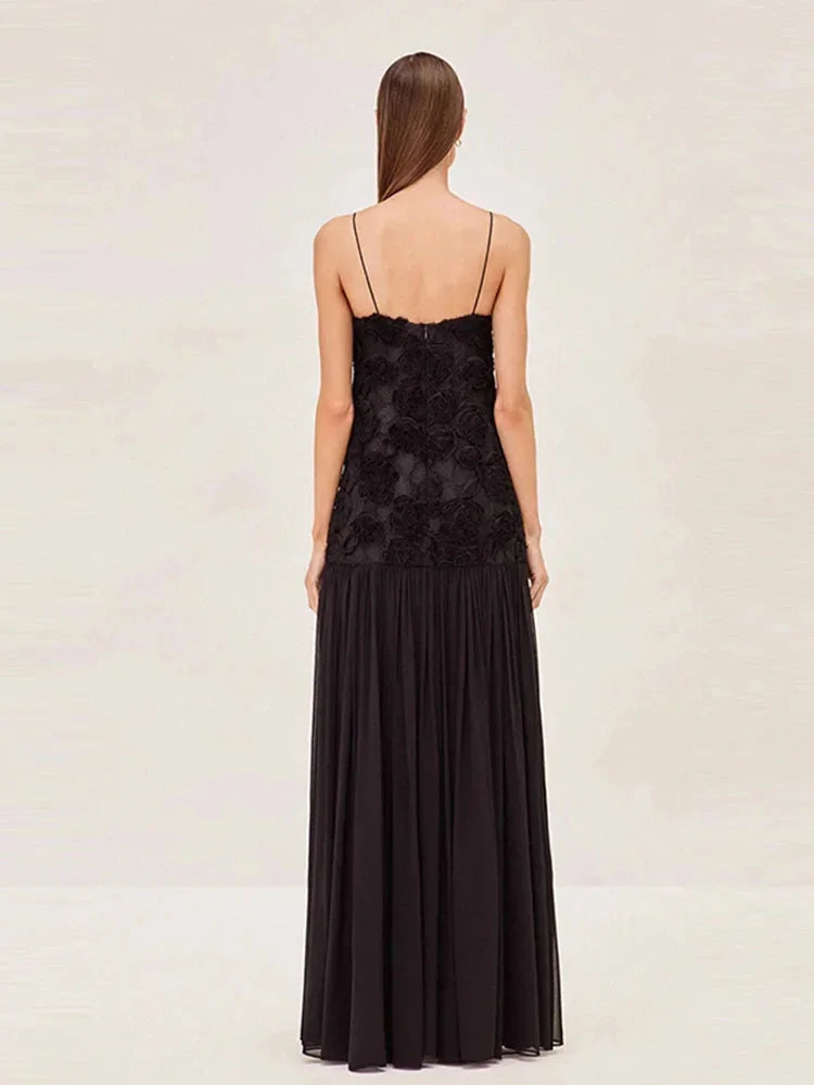 Sleeveless lace top maxi dress with intricately designed lace detailing and flowing silhouette by Asuna.