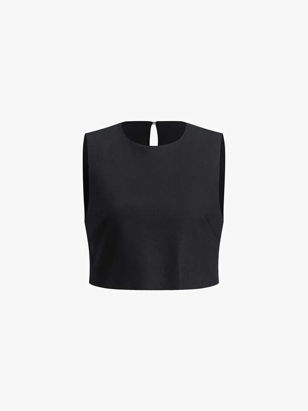 "Black asymmetrical crop top and wide-leg pants set in soft cotton blend. Stylish outfit with modern silhouette for…