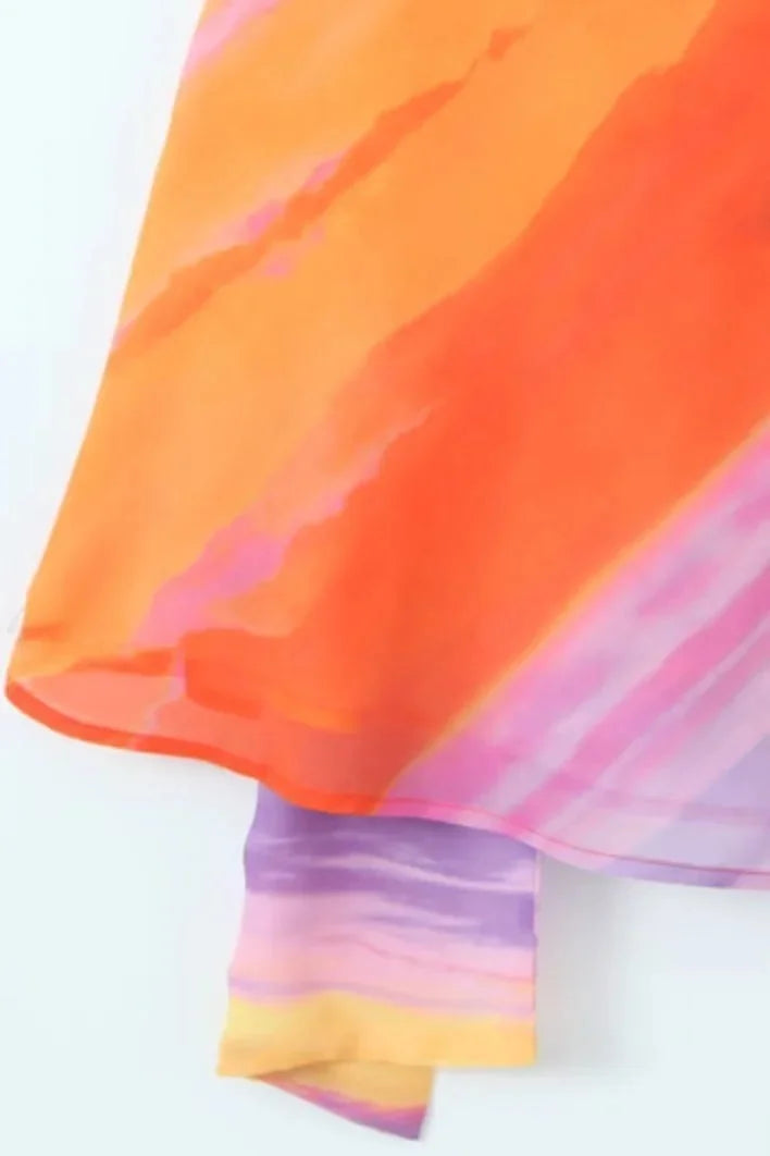Aubrey - Sunset tones halter mini dress made of flowing fabric with a vibrant color gradient design, perfect for summer…