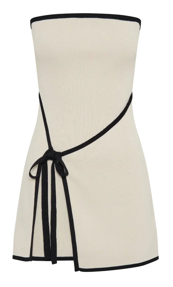 Strapless mini dress in a neutral hue, crafted from soft, flowy fabric with a flattering silhouette perfect for casual yet…
