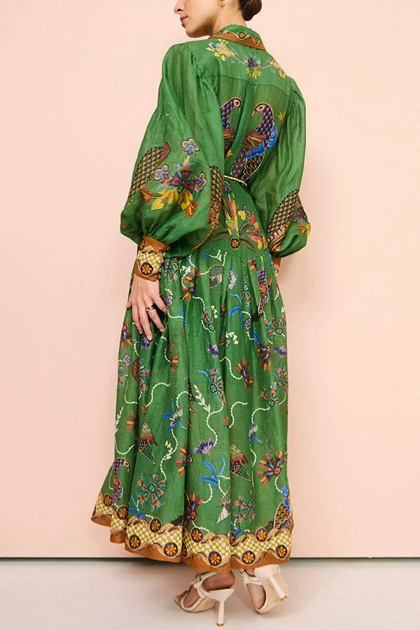 Green midi dress featuring bird print, with sleeves. A chic addition to your wardrobe, made from high-quality materials.