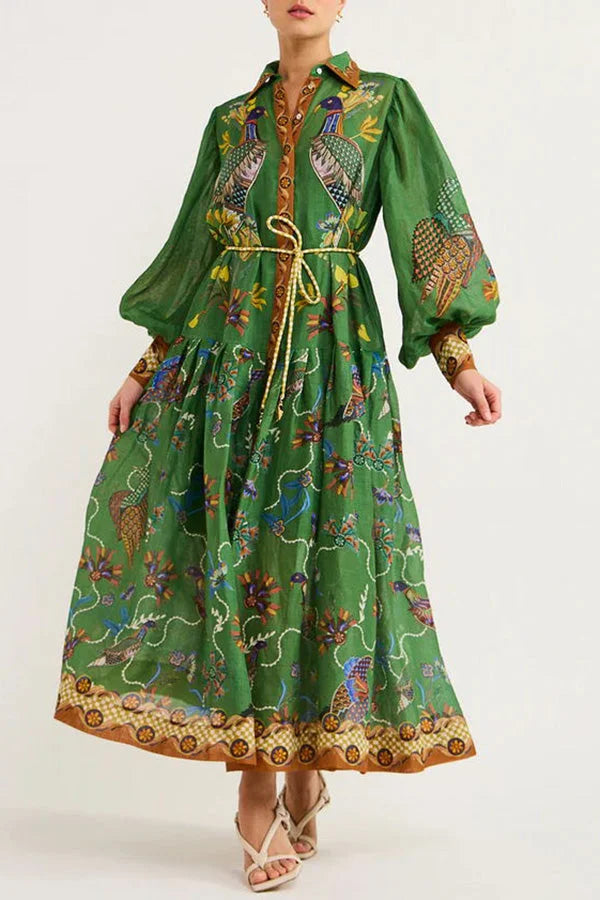 Green midi dress with bird print and sleeves, perfect for casual occasions. Made of comfortable fabric, versatile and…