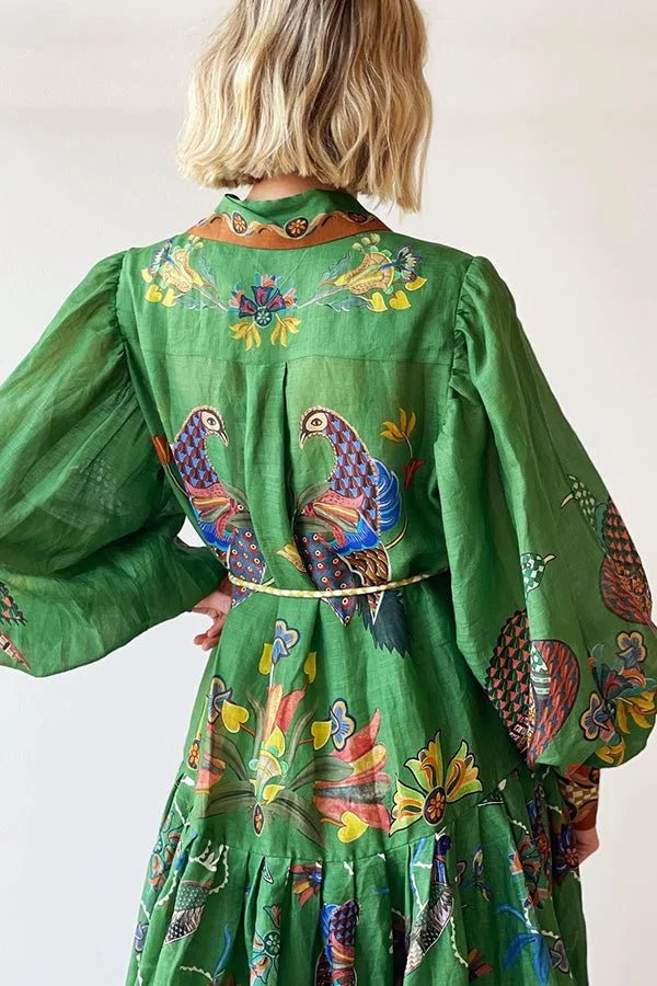 Green midi dress featuring bird print, flattering sleeves. Crafted from soft, breathable fabric for all-day comfort and…