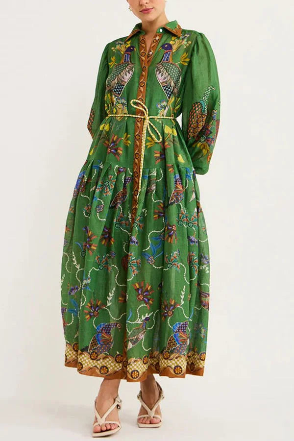 Green midi dress with bird print and sleeves, perfect for casual outings. Made from flowing fabric with a nature-inspired…