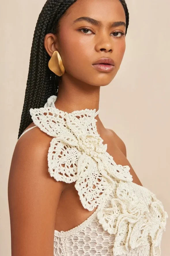 Off-shoulder white crochet dress with intricate detailing and flared sleeves by Avamarie, perfect for a romantic summer look.