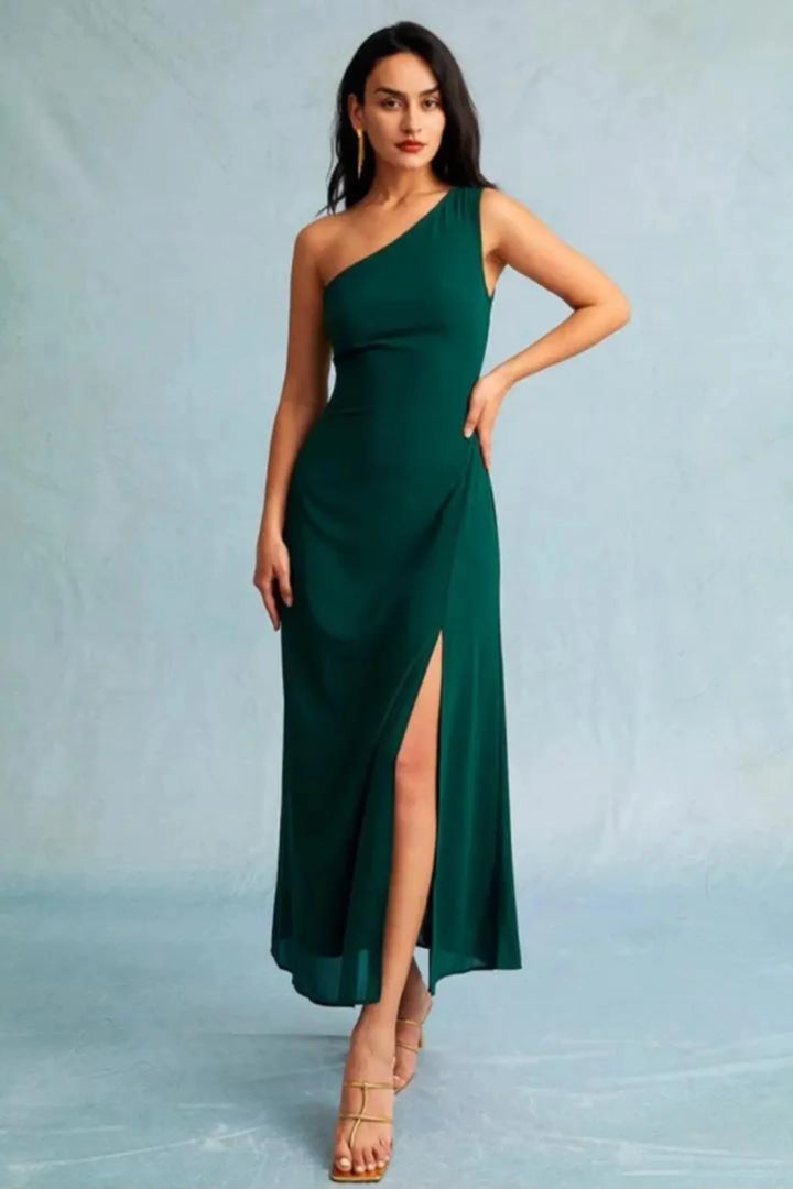 "Dark green one-shoulder maxi dress in elegant design, perfect for special occasions. Features a sleek one-shoulder style."