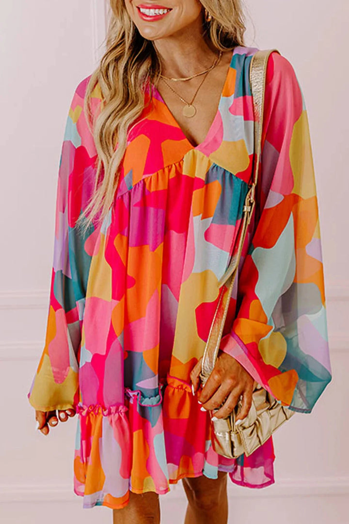 Colorful printed V-neck babydoll dress by Averee, made of soft and flowy fabric, perfect for a casual chic look.