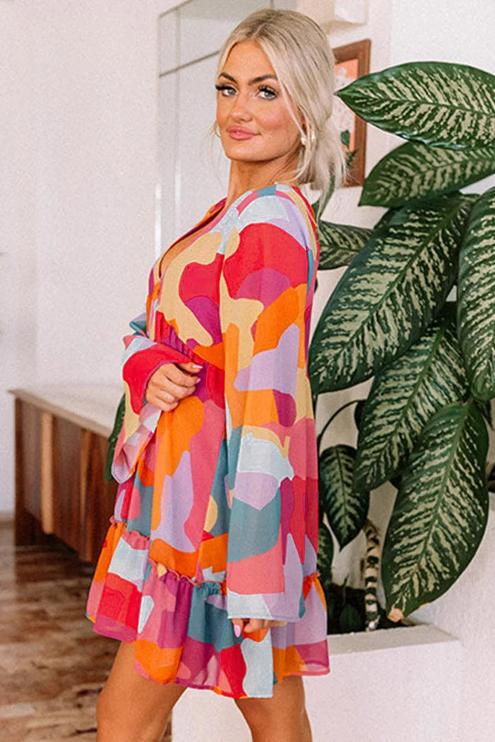 "Vibrant V-neck babydoll dress with eye-catching print, perfect for a stylish and comfortable look."