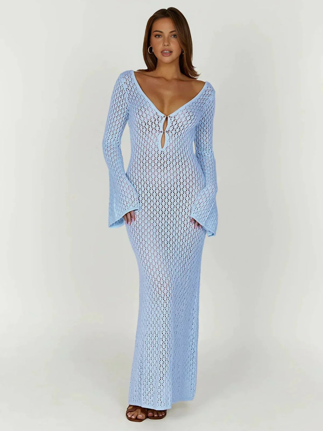 Blue crochet dress with elegant neckline, crafted from high-quality fabric, perfect for a chic and stylish look.
