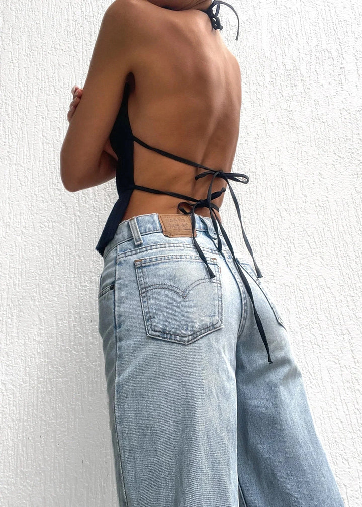 Black halter top showcasing metallic chain detailing and a stylish design by Avonlea for women.
