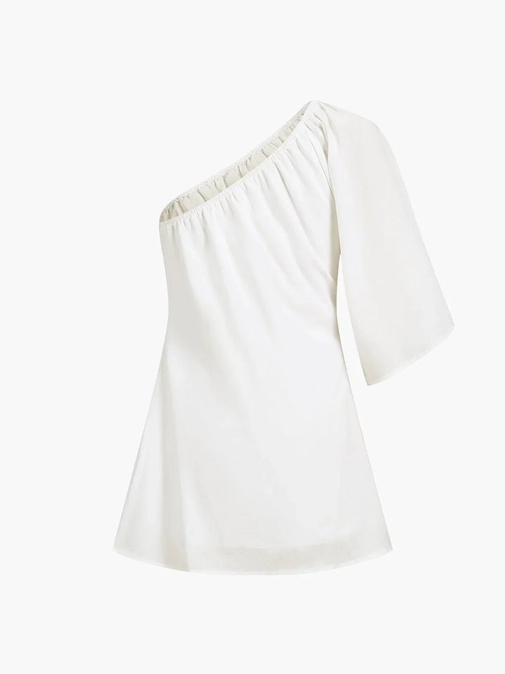 Off-shoulder mini dress in light blue with puff sleeves, perfect for a summer day out or a casual evening event.
