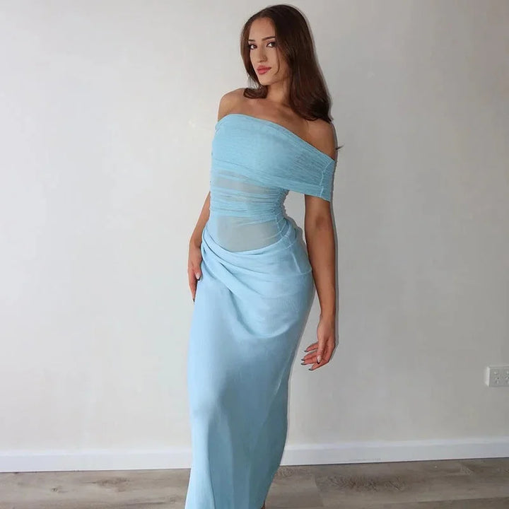 Off-shoulder ruched maxi dress in Azucena, featuring a waist cut-out. Made with lightweight, breathable fabric perfect for…