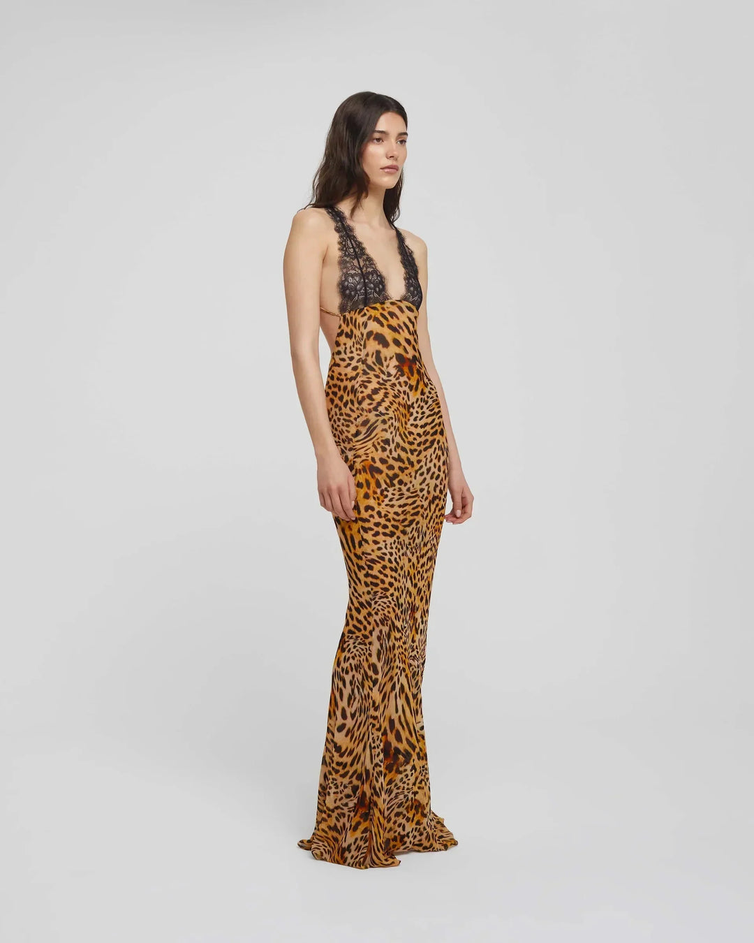 "Beaux animal print maxi dress with plunging neckline, perfect for a stylish and bold look. Made with comfortable and flowy…
