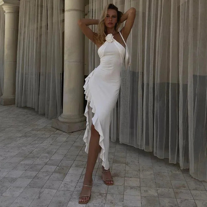 White halter midi dress for women, featuring an asymmetrical design. Stylish and versatile, perfect for a casual or formal…