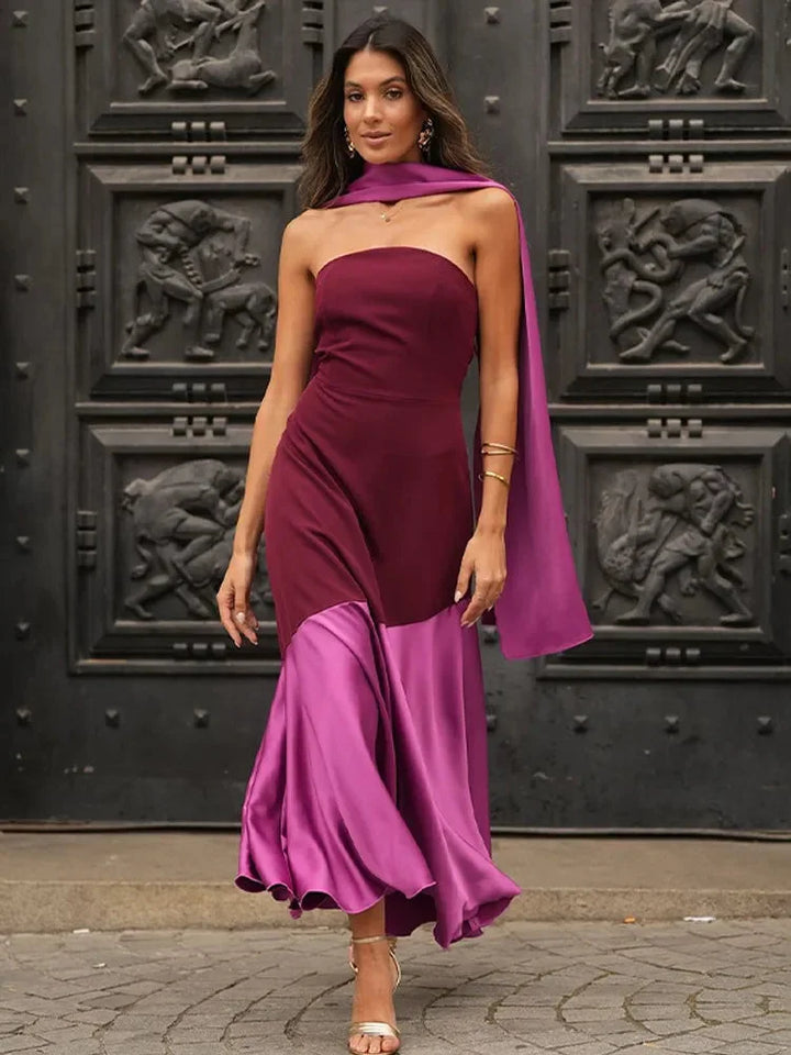 Asymmetric midi dress in burgundy and pink, featuring a unique design and made with a high-quality fabric blend.