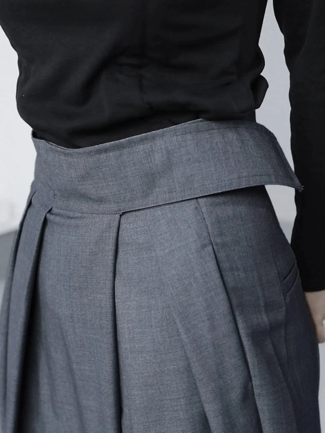 "Black wide-leg pants with adjustable fit, perfect for all-day comfort. Versatile and stylish addition to your wardrobe."