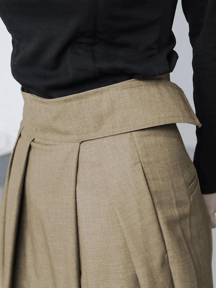 "Black wide-leg pants with adjustable fit for comfort, ideal for everyday wear or casual occasions."
