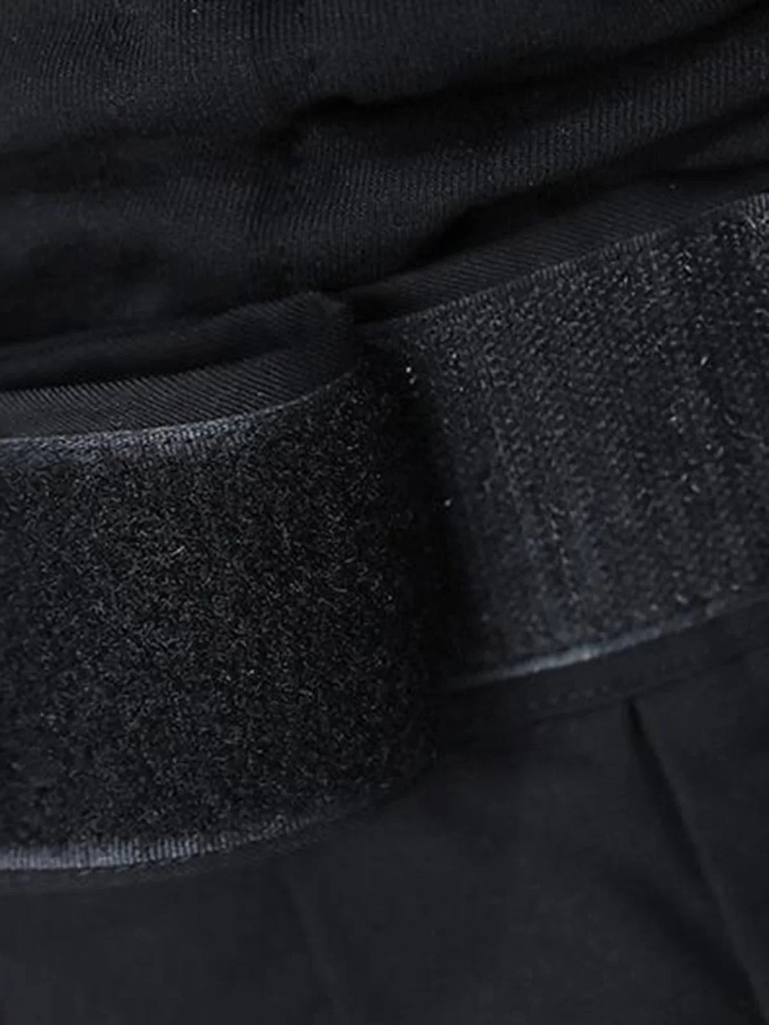 "Dark navy wide-leg pants with adjustable fit waistband, suitable for casual or formal wear."