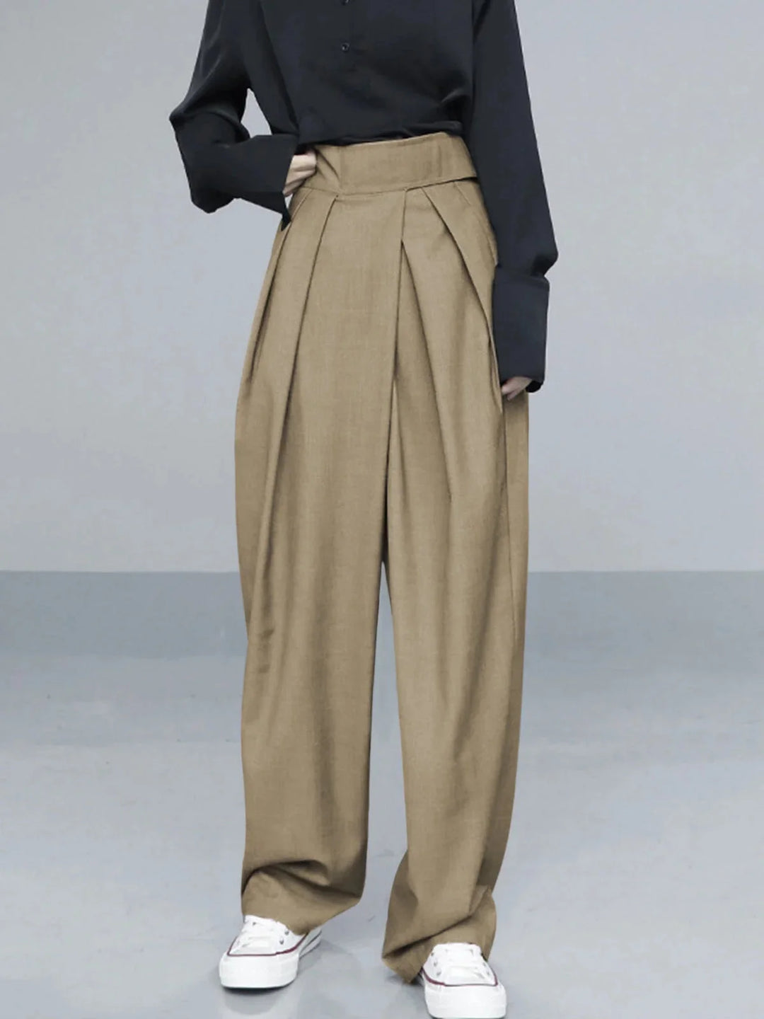 Khaki wide-leg pants with adjustable fit from Boston. Made with soft, breathable fabric for all-day comfort and versatile…