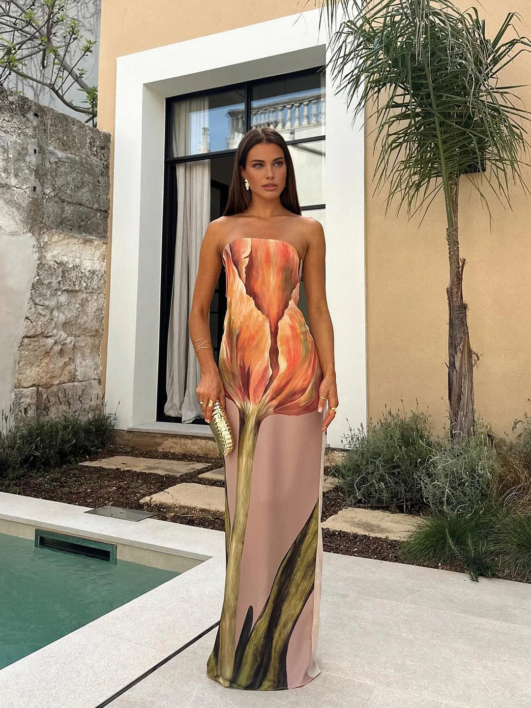 Strapless maxi dress with floral design in soft cotton blend, perfect for spring festivities and casual gatherings.