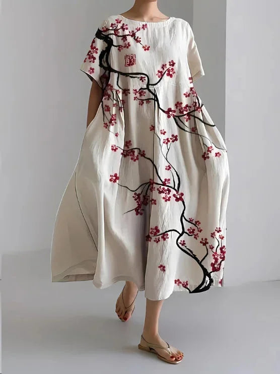Bridgette Floral Maxi Dress in Cherry Blossom featuring a soft, comfortable fabric with a beautiful floral design perfect…