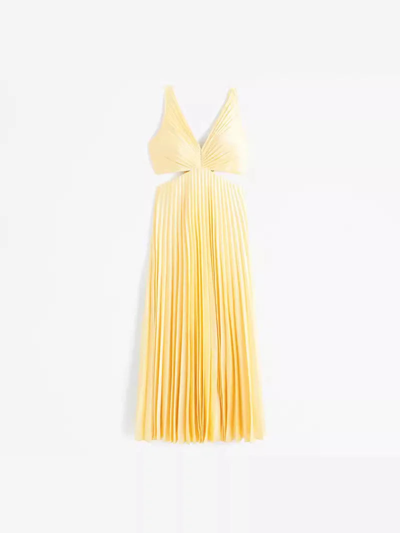 Yellow pleated maxi dress with plunging neckline from Brisa. Flowy and vibrant, perfect for summer occasions.