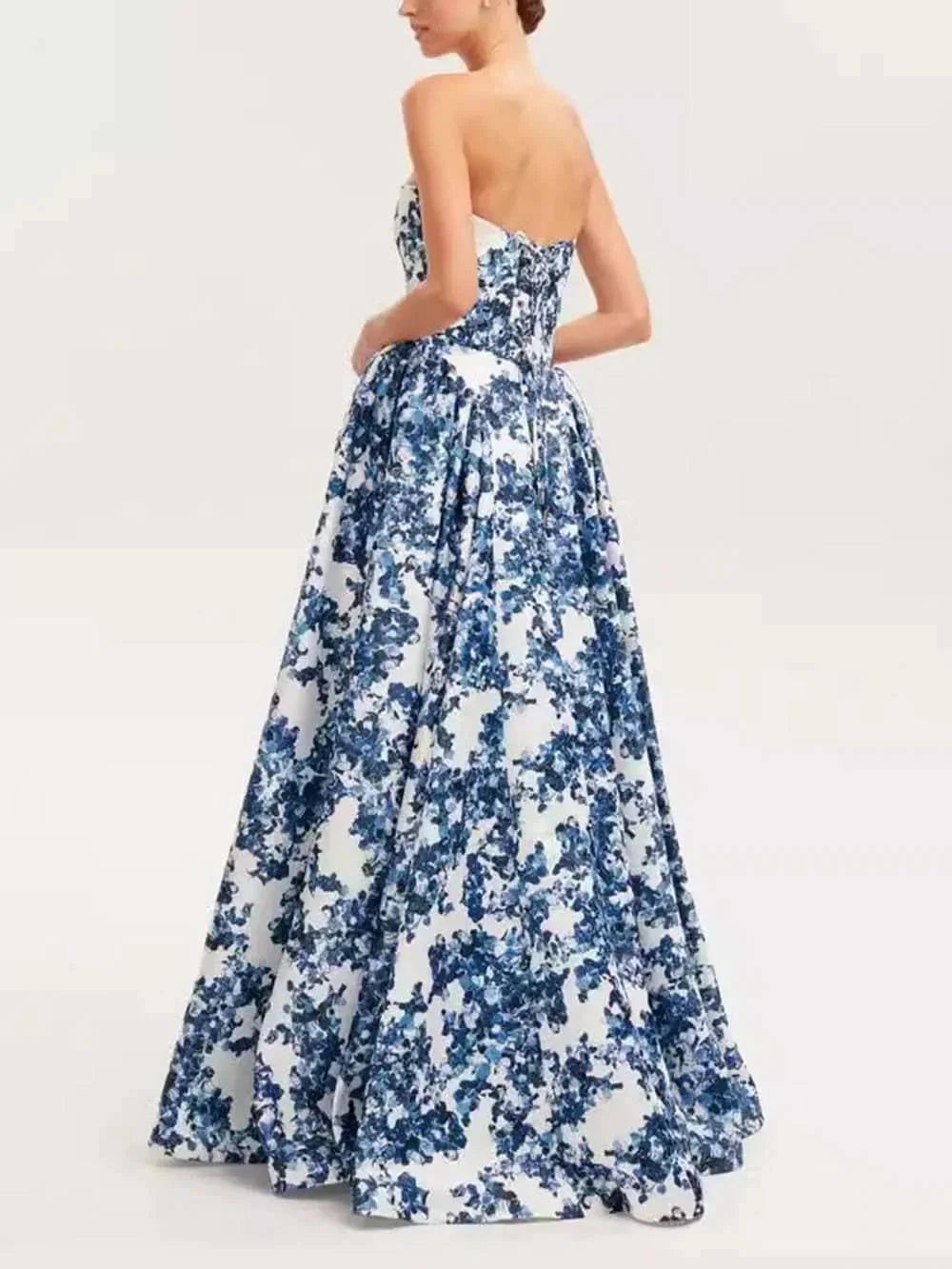 Blue floral printed strapless maxi dress in a lightweight woven fabric with a flattering silhouette perfect for summer…