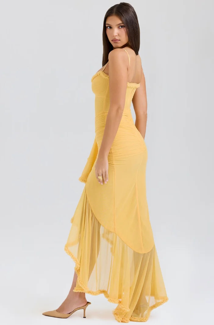 Fitted midi dress in Cali style with ruffled details, made from soft cotton fabric in a sleek silhouette.