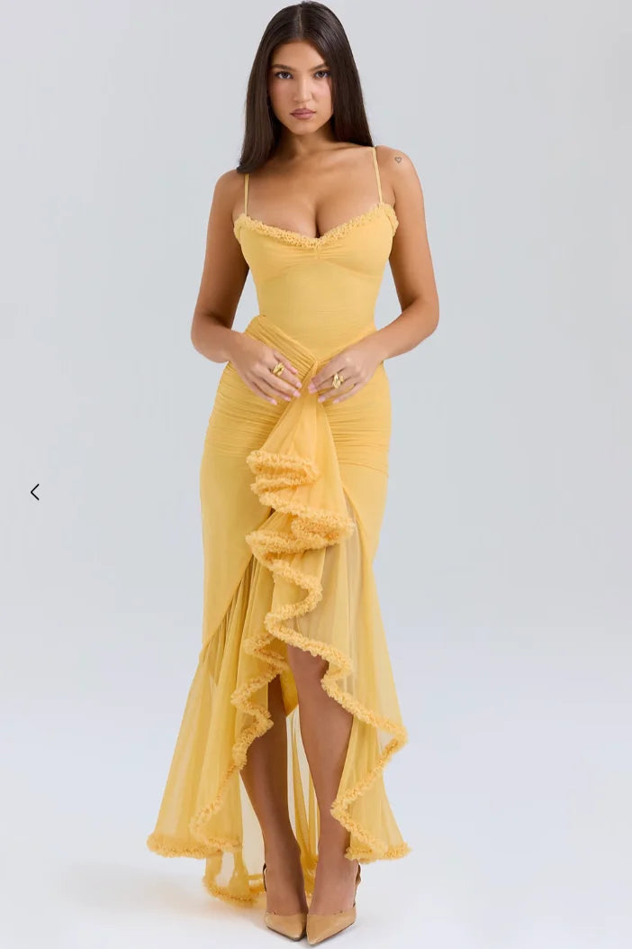 Yellow fitted midi dress with ruffled details, perfect for a sunny day. Made of soft, flowy fabric with a flattering…