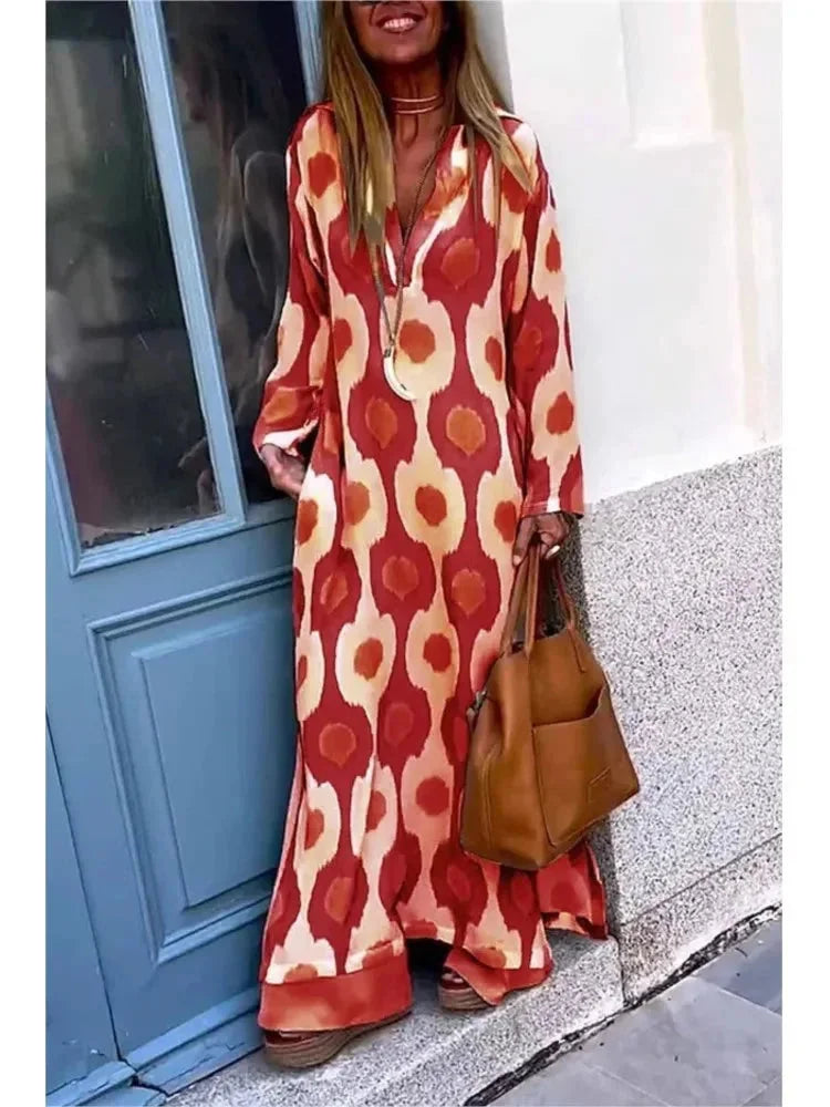 Long-sleeve V-neck maxi dress in a soft cotton blend fabric with a relaxed fit and flattering silhouette.