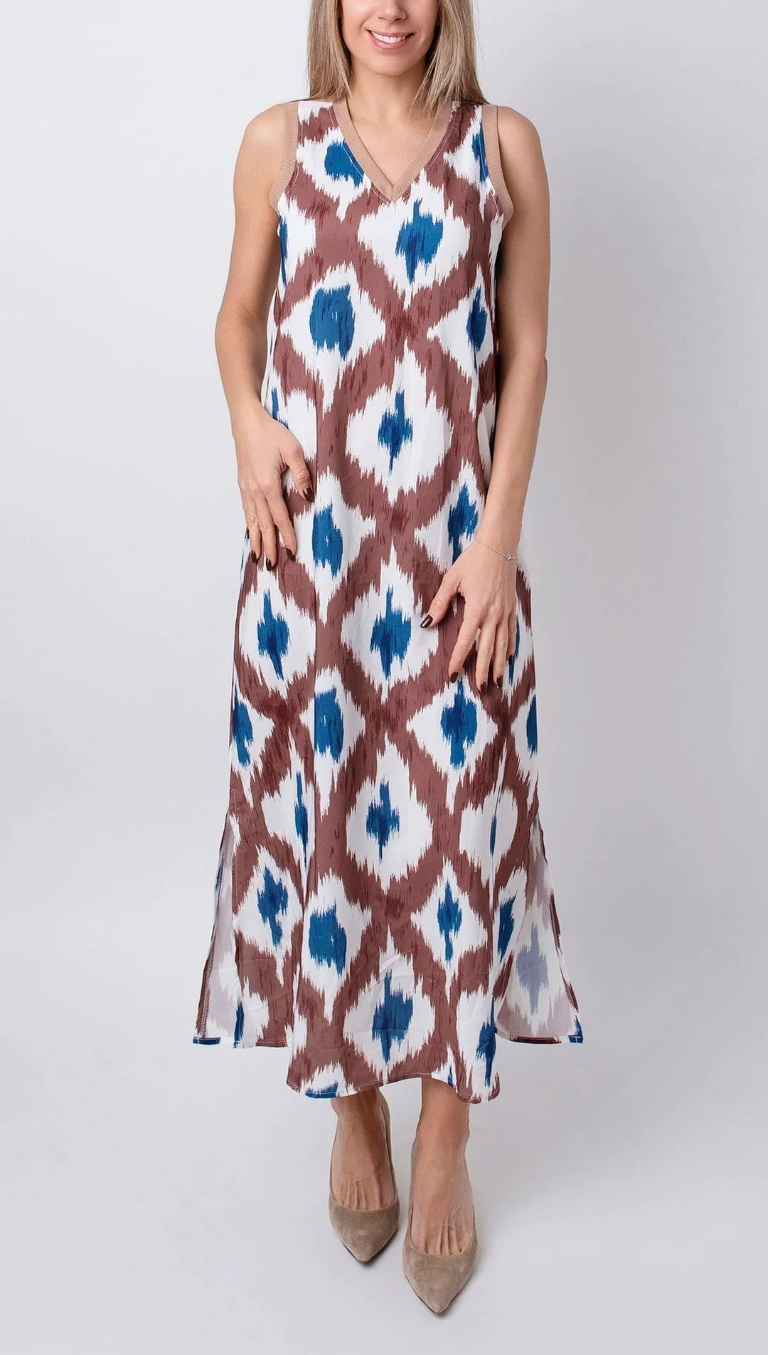 Sleek black maxi dress with a V-neck design, perfect for summer days. Made from soft and breathable fabric.