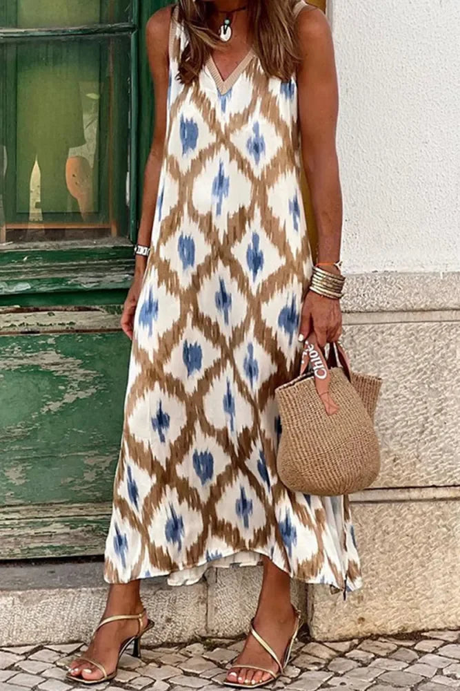"Sleeveless maxi dress in navy with V-neck, perfect for summer. Comfortable and stylish for casual or dressy occasions."