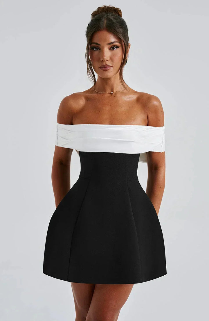 Off-shoulder mini dress in two-tone design, featuring a lightweight and breathable fabric perfect for summer outings.