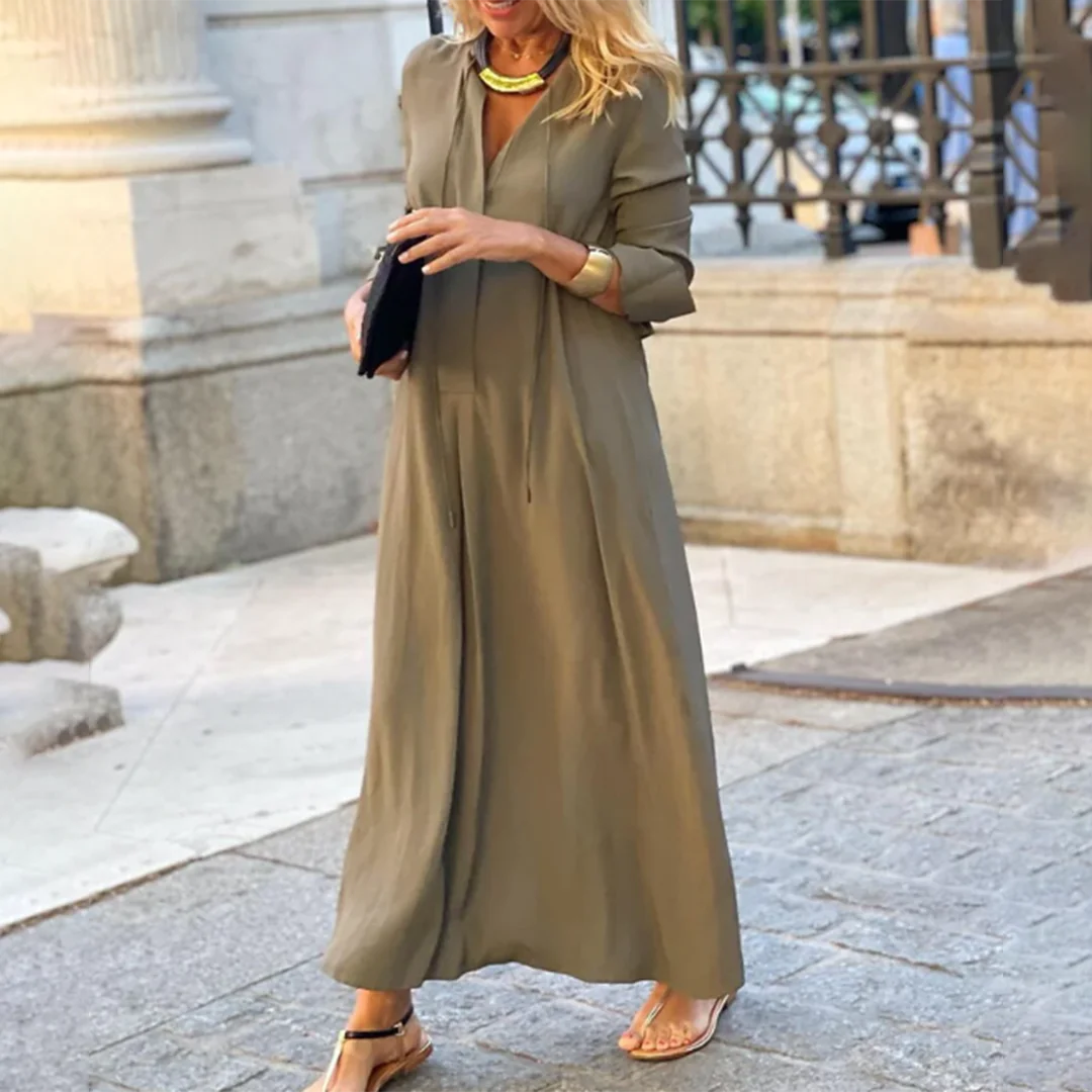 Brown maxi dress made from soft cotton blend, designed for comfort and versatility. Ideal for everyday wear or casual…