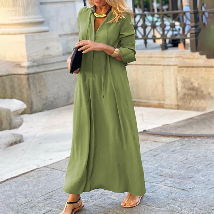 "Green Carson Maxi Dress, a stylish and comfortable dress designed for versatility with a flowy silhouette in soft and…