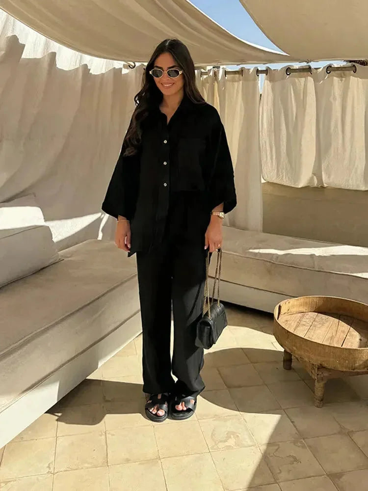 Two-piece set in Black, made of soft and comfortable cassia fabric, versatile style for everyday wear.