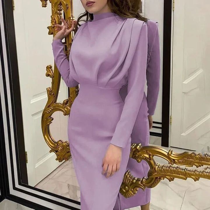 Purple high-neck maxi dress with dramatic sleeves, showcasing intricate lace detailing. Perfect for a sophisticated evening…
