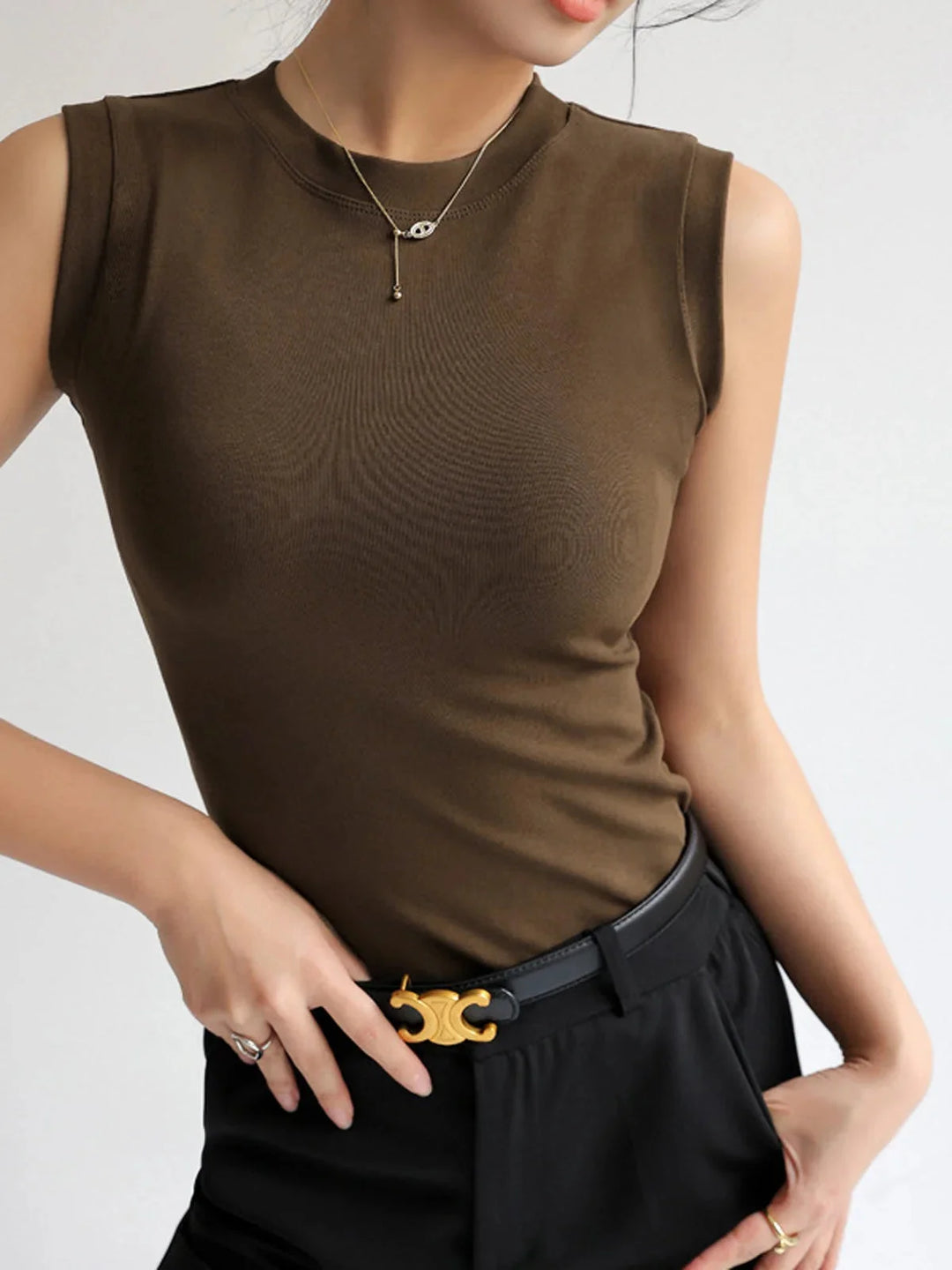 Sleek and versatile Cheyenne top in comfortable, stretchy fabric with a form-fitting sleeveless design perfect for layering…