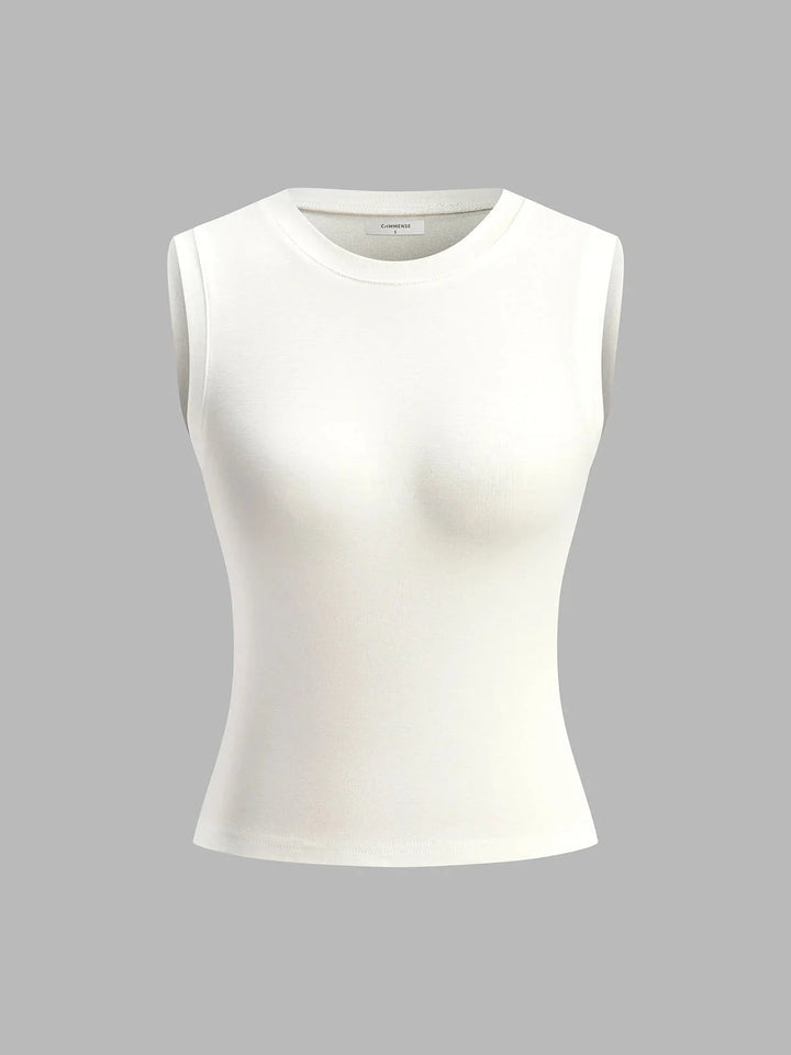 Sleeveless fitted top in soft grey fabric with V-neck and ribbed texture. Versatile design for layering or stand-alone wear.