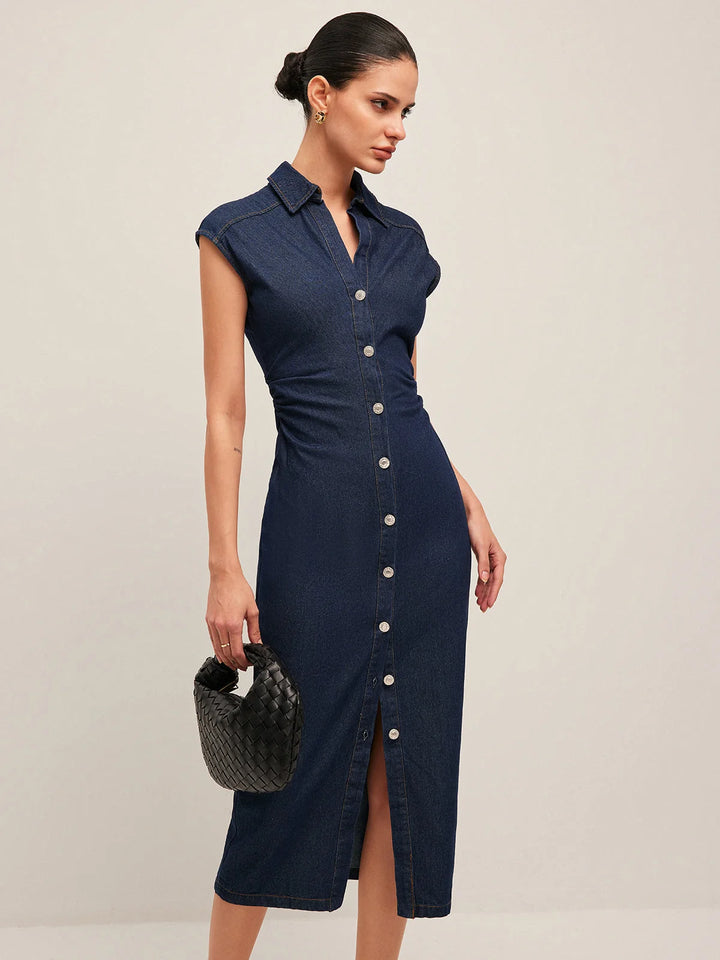 "Sleeveless dark blue denim midi dress with V-neck, perfect for casual wear."