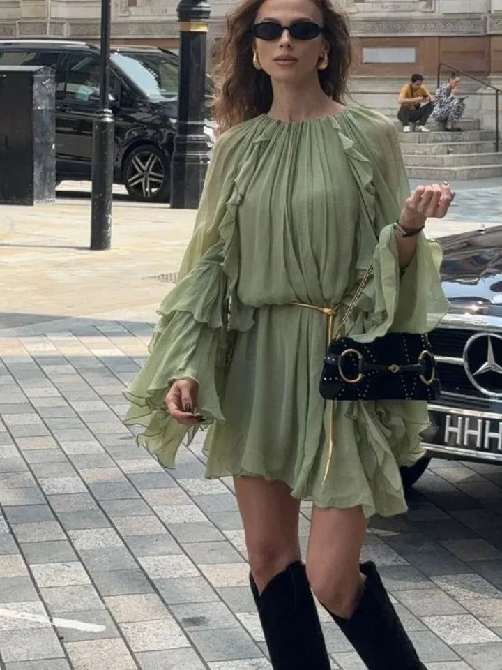 Ethereal sage dress with layered ruffles, made of lightweight chiffon fabric, perfect for a romantic occasion or a casual…