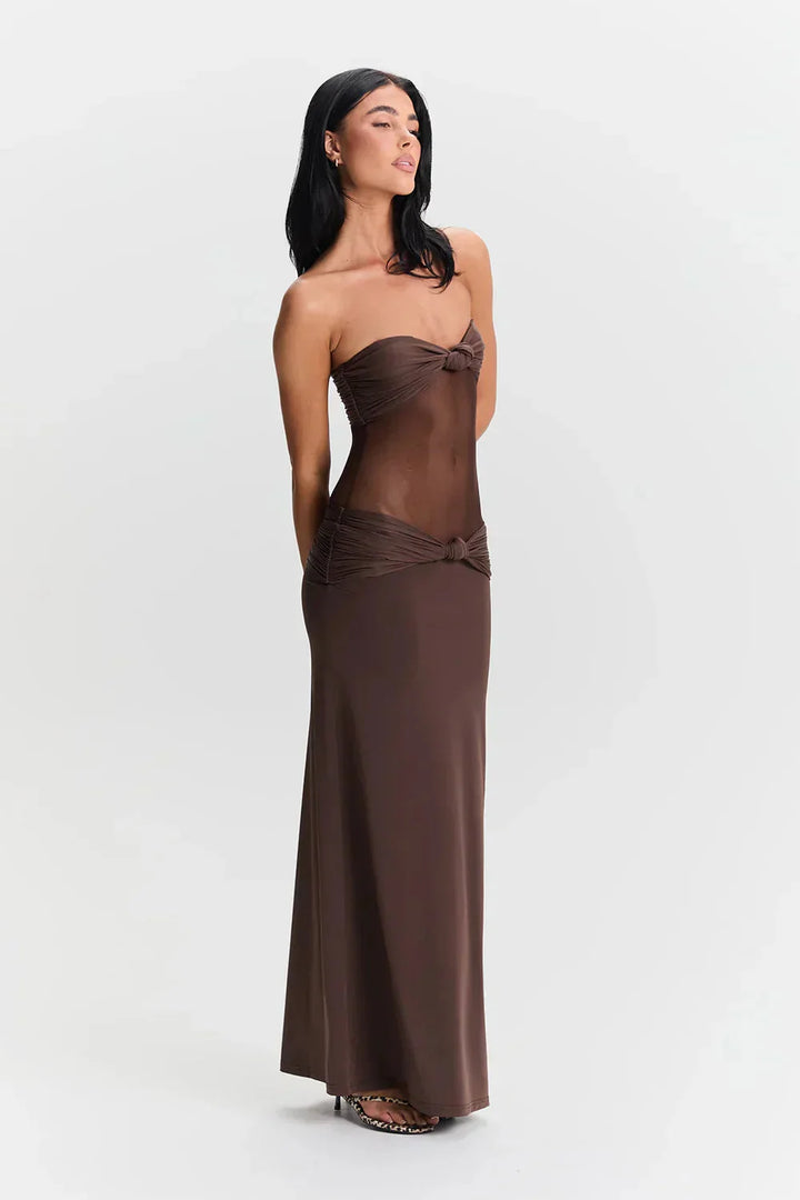 Black strapless maxi dress with mesh bodice for women by Dailany. Features a stylish and elegant design perfect for formal…