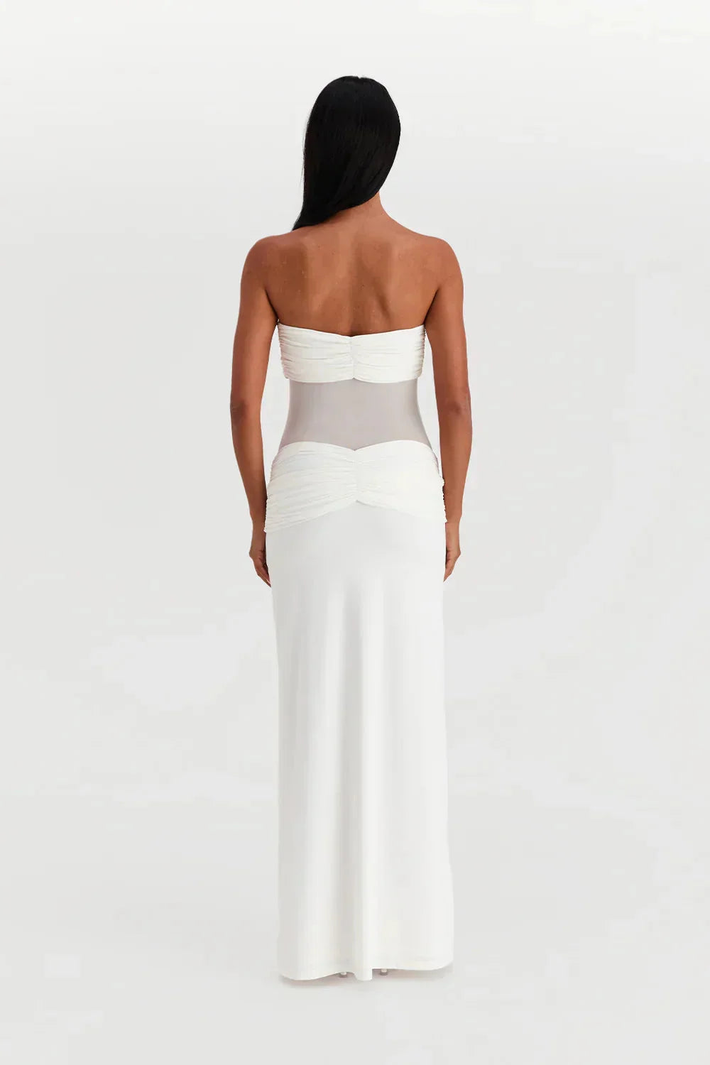 Women's strapless maxi dress in black with mesh bodice and flowy skirt, perfect for a night out or special occasion.