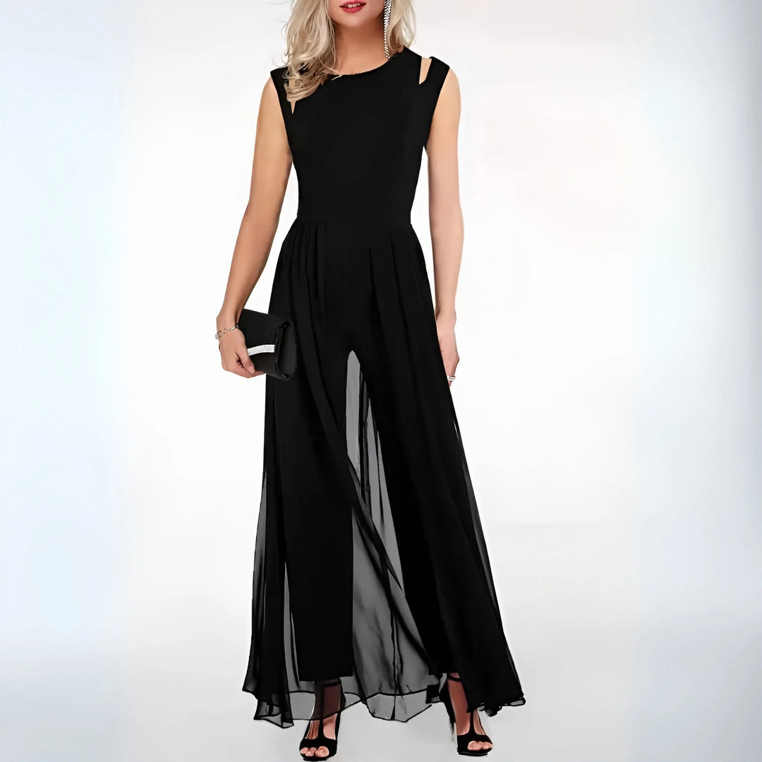 "Sleeveless maxi dress in Black with stylish side cutouts, perfect for summer outings, made of breathable fabric for all-day…